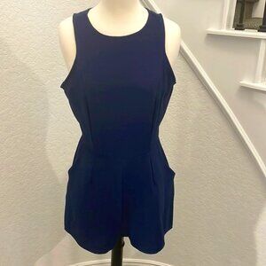 Like new One Clothing solid navy blue romper with two pockets. Large